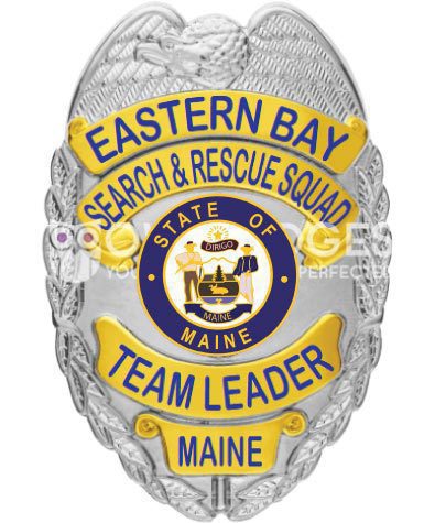 security officer Eastern Bay Search and rescue Squad team leader a silver and yellow badge