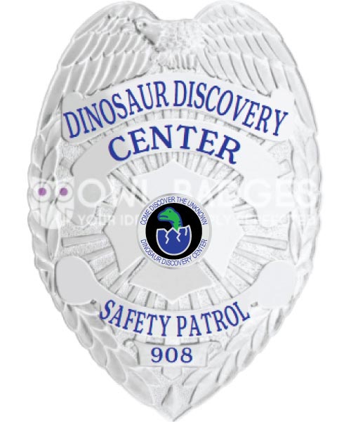 Dinosaur Discovery Center Safety Patrol Silver Badge with blue text. Style # 3-a1