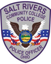sewn patches salt rivers community college police officer a gray patch with a purple and blue emblema close-up of a badge
