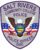 sewn patches salt rivers community college police officer a gray patch with a purple and blue emblema close-up of a badge