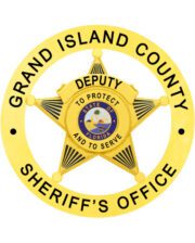 sheriff badge Grand Island County Sheriff s' office a yellow badge with a star