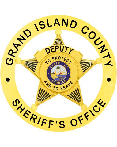 sheriff badge Grand Island County Sheriff s' office a yellow badge with a star