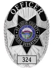 Badge for police St. Louis County police Department with star and silver text.