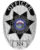 Badge for police St. Louis County police Department with star and silver text.