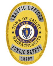 police badge town of Balley Massachusetts a yellow badge with a blue circle and text