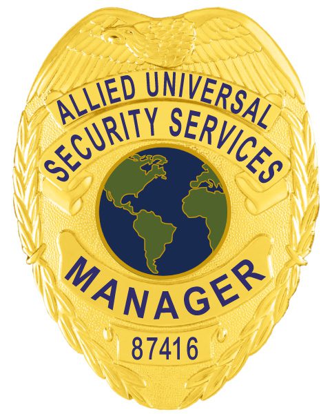 A striking visual of a custom metal badge in gold color, highlighting its ornate design and prominent globe emblem, featuring the words “Allied Universal Security Services” and a reliable safety pin attachment for optimal security.