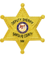 Badge Sheriff Deputy Sheriff Santa Fe County a gold star shaped badge