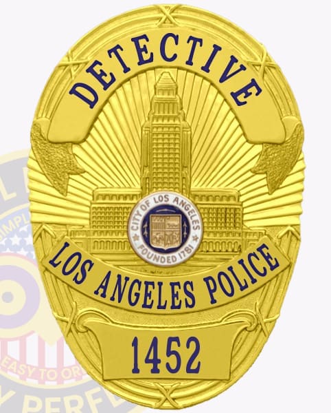 This custom metal badge in gold showcases "DETECTIVE" boldly at the top. The centerpiece depicts the iconic Los Angeles City Hall, framed by the words "LOS ANGELES POLICE" and the number "1452." The badge includes a safety pin attachment for easy and reliable fastening.