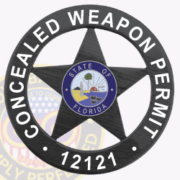 A black star-shaped badge prominently displaying the words 'CONCEALED WEAPON PERMIT' around the edge. At the center, a circular emblem features the state seal of Florida, highlighting symbols of state pride. The badge number '12121' is clearly visible at the bottom. This badge serves as an official representation of a concealed weapon permit, making it an essential item for those seeking to carry firearms responsibly.