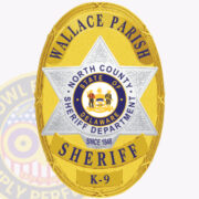 An image of a custom oval shape sheriff badge featuring a prominent six-point sheriff star at its center. The badge is gold with the text 'WALLACE PARISH' at the top and 'SHERIFF' at the bottom, with 'NORTH COUNTY SHERIFF DEPARTMENT' and 'STATE OF DELAWARE' displayed in blue. The center includes a circular emblem with symbols of law enforcement and the text 'SINCE 1848.' This visual exemplifies custom badges oval shape sheriff badge with 6 point sheriff star badge inside, highlighting the detailed design and significance of the badge.