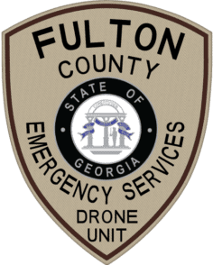 Fulton county emergency police patches in tan
