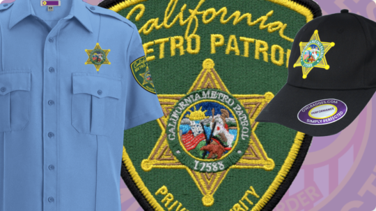 A close-up view of a uniform featuring a light blue shirt with two chest pockets, showcasing a California Metro Patrol embroidered patch on the sleeve. The image also includes a detailed green and gold embroidered patch displaying the California Metro Patrol emblem, along with a black cap adorned with a similar badge. This visual highlights custom patches that allow users to reproduce existing embroidered designs, modify them, or submit new patch designs for uniforms.