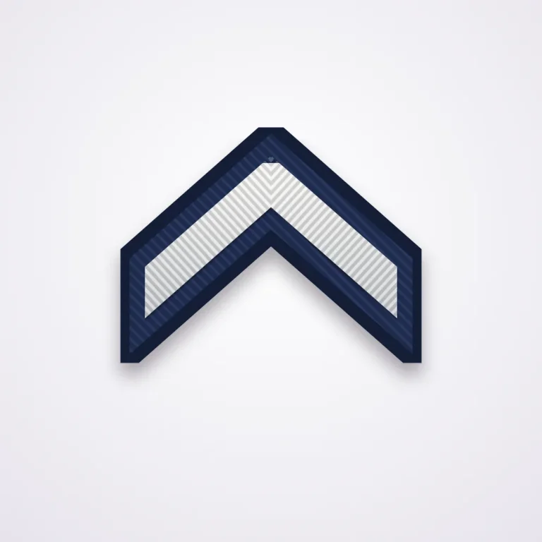 Police Ranks 32 Illustration of a single-chevron officer first class patch in white thread on navy twill