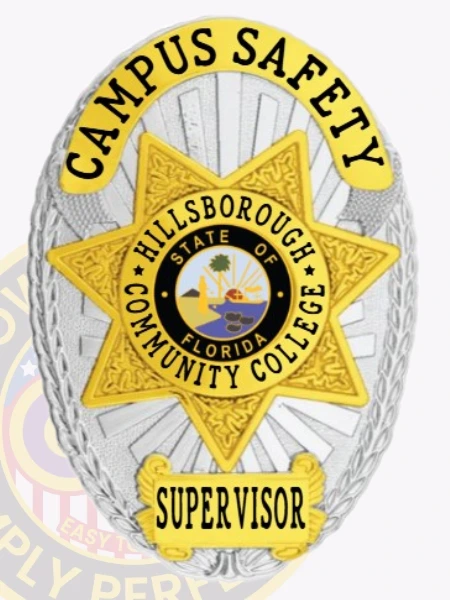 Featuring a detailed custom metal badge in silver color with gold accents and a secure safety pin attachment, this badge reads "CAMPUS SAFETY" prominently. The star design incorporates the Hillsborough Community College logo and the title "SUPERVISOR," reinforcing its purpose for campus leadership.