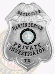 A detailed image of a custom metal badge in silver color with a safety pin attachment, highlighting "PRIVATE INVESTIGATOR" and the Texas state seal. This badge’s polished design reflects its importance as a distinguished accessory for investigators.