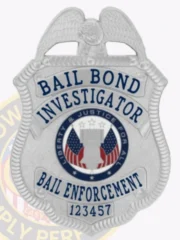 A polished image of a custom metal badge in silver color, featuring a shield design with the inscription “Bail Bond Investigator” and “Bail Enforcement,” complete with a central emblem and a safety pin attachment for secure wear.