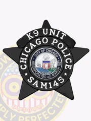 A bold custom metal badge in black color featuring a star shape. The badge prominently displays "K9 UNIT" and "CHICAGO POLICE" around a central circular emblem depicting the seal of Chicago. It includes a safety pin attachment for secure fastening on uniforms.