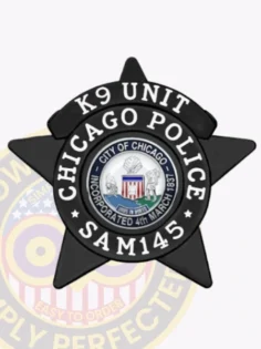 A bold custom metal badge in black color featuring a star shape. The badge prominently displays "k9 unit" and "chicago police" around a central circular emblem depicting the seal of chicago. It includes a safety pin attachment for secure fastening on uniforms.
