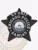 A bold custom metal badge in black color featuring a star shape. The badge prominently displays "K9 UNIT" and "CHICAGO POLICE" around a central circular emblem depicting the seal of Chicago. It includes a safety pin attachment for secure fastening on uniforms.