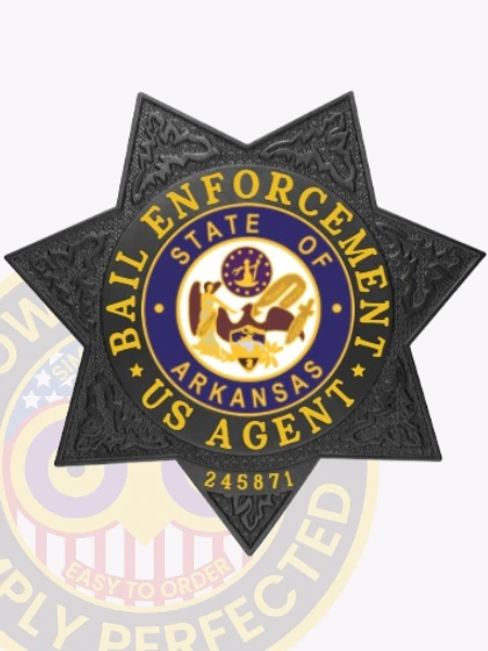 An engaging representation of a custom metal badge in black color, exhibiting an elegant design with the name “State of Arkansas” in the center and the title “Bail Enforcement US Agent,” designed with a safety pin attachment for effortless integration into attire.