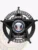 A polished visual of a custom metal badge in black color, exhibiting an elegant star design with prominent text stating “Fugitive Recovery,” designed with a practical safety pin attachment for dependable use on clothing.