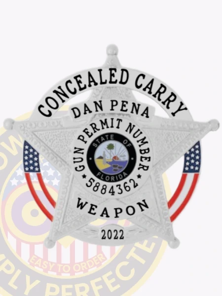 A custom metal badge gleaming in silver is presented here, showcasing "CONCEALED CARRY" and the identification number "5884362." The safety pin attachment allows for easy and secure wear, making it ideal for professionals who require reliable identification.