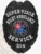 This striking custom metal badge in black color showcases the "FIRST RESPONDERS" emblem and the designation "SERVICE," designed for paramedics, complete with a safety pin attachment for reliable fastening.