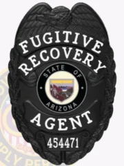 A captivating visual of a custom metal badge in black color, highlighting its ornate design with the phrase “Fugitive Recovery” and a central Arizona seal, featuring a reliable safety pin attachment for optimal security on uniforms.