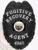A captivating visual of a custom metal badge in black color, highlighting its ornate design with the phrase “Fugitive Recovery” and a central Arizona seal, featuring a reliable safety pin attachment for optimal security on uniforms.