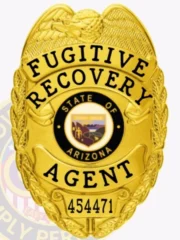 A polished visual of a custom metal badge in gold color, exhibiting an elegant design with the name “State of Arizona” and the title “Fugitive Recovery Agent,” designed with a practical safety pin attachment for dependable use on clothing.