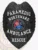 A bold custom metal badge in black color featuring "PARAMEDIC" and "NORTHWARD AMBULANCE," equipped with a safety pin attachment for secure wear by emergency responders.