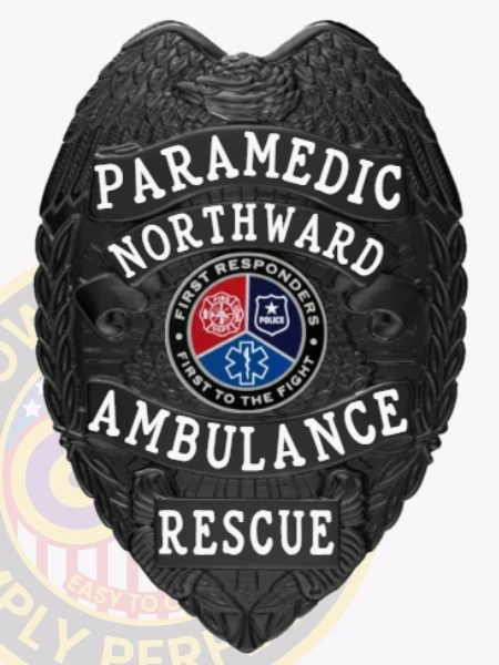 A bold custom metal badge in black color featuring "PARAMEDIC" and "NORTHWARD AMBULANCE," equipped with a safety pin attachment for secure wear by emergency responders.