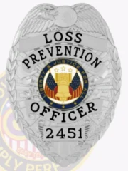 An eye-catching custom metal badge in silver color, adorned with "LOSS PREVENTION OFFICER" prominently displayed above a central emblem symbolizing liberty and justice. The badge features a unique identification number, 2451, and comes with a safety pin attachment for secure placement.
