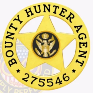 5 Point Star Bounty Hunter Badge 20-A16-2Bh 2 Close-up view of a custom metal badge in gold color with a safety pin attachment, showcasing the unique identifier "275546. " the intricate design emphasizes the star shape and the eagle emblem, highlighting its significance for law enforcement professionals.