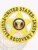 An eye-catching image of a custom metal badge in gold color, showcasing a star design prominently displaying the words “Fugitive Recovery Agent” and “United States,” equipped with a safety pin attachment for easy fastening to clothing.