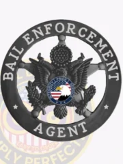 A detailed image of a custom metal badge in black color with a safety pin attachment, highlighting "BAIL ENFORCEMENT AGENT." This badge’s refined design showcases its importance as a distinguished accessory for professionals in the bail enforcement industry.