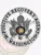 An artistic representation of a custom metal badge in silver color, showcasing the emblem of a majestic eagle and the phrase “Fugitive Recovery Agent” encircling the badge, equipped with a safety pin attachment for easy wear.