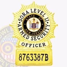 Gold starburst shaped metal badge designed for sora level 2 armed security officers, showcasing the new jersey state emblem at the center, encircled by black lettering, 'sora level 2 armed security officer,' and an identification number panel below, secured with a safety pin.