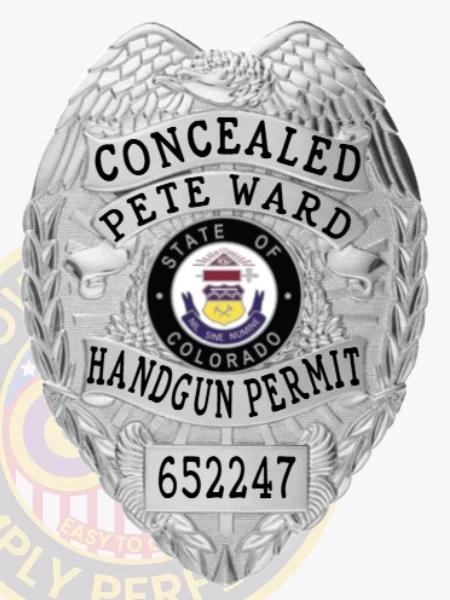 A custom metal badge gleaming in silver is presented here, showcasing "CONCEALED" and the identification number "652247." The safety pin attachment allows for easy and secure wear, making it perfect for professionals looking to project authority effectively.