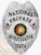 Close-up view of a custom metal badge in silver color with a safety pin attachment, highlighting the inscription "NATIONAL PRIVATE INVESTIGATOR." The badge's intricate detailing includes the Alabama state seal, adding an element of sophistication to this essential accessory.