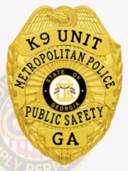 Featuring a striking custom metal badge in gold color, this design includes a shield shape with "K9 UNIT," "METROPOLITAN POLICE," and "PUBLIC SAFETY" clearly inscribed around a central emblem representing Georgia. The badge is completed with a safety pin attachment for easy application on uniforms.