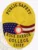 A polished custom metal badge in gold color equipped with a safety pin attachment, featuring "PUBLIC SAFETY" prominently at the top. The badge includes a central eagle design and the flags of Texas and the U.S., along with "ROCK HARBOR COLLEGE" and "CHIEF" for clear identification of rank.