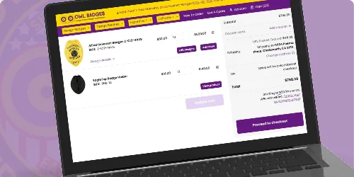 A laptop screen displaying the Owl Badges website featuring Custom Allied Universal Badges in gold. The webpage shows detailed badge images, pricing, and purchase options, helping users determine when to buy high-quality, professional gold badges tailored for Allied Universal personnel. The website’s bold purple and yellow interface ensures a seamless and accessible shopping experience