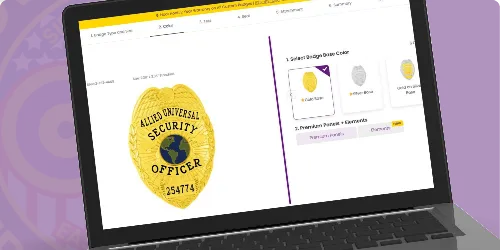 A laptop screen displaying an online customization tool for creating custom Allied Universal badges. The highlighted badge is oval-shaped with a polished gold finish, featuring the bold text 'Allied Universal Security Officer' above a globe emblem, and a badge number '254774' below. On the right side of the interface, users can select badge colors, including options like silver and black, as well as customize additional features. This image illustrates where to buy custom Allied Universal badges through a user-friendly online platform designed for professional badge creation.