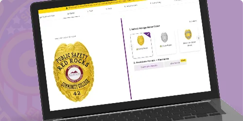A laptop screen displaying an online design tool for creating custom campus safety badges and university security badges. The featured badge is an oval-shaped gold design with the text 'Public Safety Red Rocks Community College' prominently displayed in bold lettering. Below, the badge number '42' adds a personalized touch. The interface on the right side allows users to choose badge colors, including options like silver and black, as well as premium finishes for customization. This image highlights where to buy custom campus safety badges and university security badges through a user-friendly online platform designed for professional badge creation.
