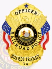 A striking custom metal badge in gold, shaped like a shield with detailed features. The badge prominently displays "OFFICER" at the top in bold lettering, followed by "RAILROAD POLICE" beneath it. In the center, the state seal of West Virginia is shown within a circular design, featuring two American flags and surrounded by a decorative eagle. Below the seal, "BOARDS TRANSIT" is inscribed, along with the number "34" at the bottom. The shiny gold finish of this custom metal badge in gold enhances its professional appearance, symbolizing pride and authority in law enforcement.