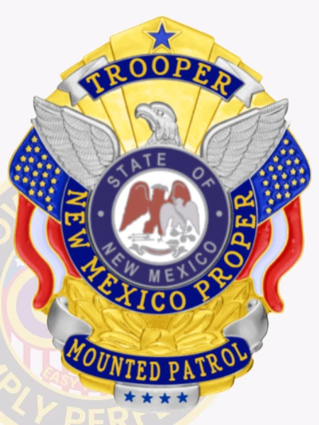 A custom metal badge in gold with silver and reverse enamel panels, showcasing intricate details like an eagle and vibrant blue accents. The badge features the text 'TROOPER' at the top, 'NEW MEXICO PROPER' in the center, and 'MOUNTED PATROL' at the base, highlighting its authoritative and personalized design.