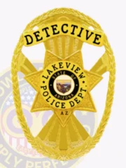 Featuring a polished design, this custom metal badge in gold has a classic star shape with refined edges. "DETECTIVE" is prominently displayed at the top in bold black lettering. The center highlights the Lakeview Police Department emblem, surrounded by "STATE OF ARIZONA" and "LAKEVIEW POLICE DEPT." in black for easy identification. A sturdy safety pin attachment ensures secure placement on clothing.
