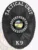 Custom metal badge in black with safety pin attachment, designed for the Tactical Unit in the Indiana Department of Corrections. The badge features the text "TACTICAL UNIT" prominently at the top, with a central state emblem encircled by "DEPARTMENT OF CORRECTIONS." The star-shaped design is highlighted by intricate textures, enhancing its authoritative look. The badge includes a "K9" designation at the bottom, indicating its specialized function. The safety pin attachment ensures secure fastening to uniforms, providing both practicality and visibility for law enforcement personnel.