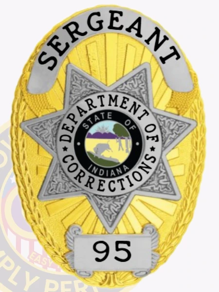 Custom metal badge in gold with silver panels and with safety pin attachment, designed for a sergeant in the Indiana Department of Corrections. The badge features the word "SERGEANT" prominently at the top, with "DEPARTMENT OF CORRECTIONS" surrounding a central state emblem. A distinct star shape highlighted by silver panels adds elegance, while the badge number "95" is displayed at the bottom. The safety pin attachment ensures secure fastening to uniforms, providing both authority and practicality for law enforcement professionals.